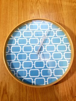 Cute Clock...Modern design..size 17 inches around..Brand New!