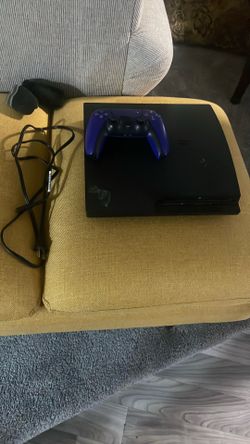PS3 with power wire and ps5 controller