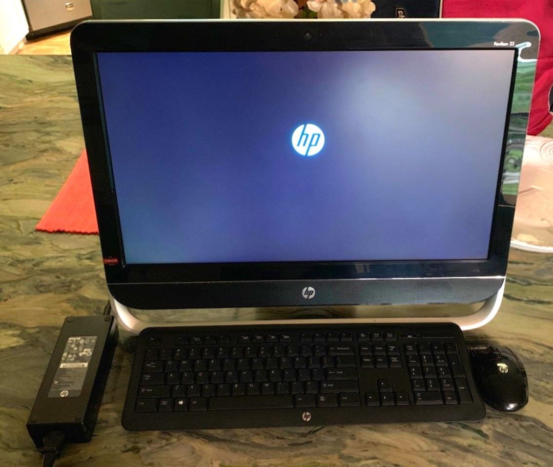 HP PAVILLION 23 All In One PC w/ 500gb Hard Drive w/ 4gb of RAM!.It has a Multi, DVD/CD Burner & Multi, Media Player w/ Wireless WiFi Adapter built-in