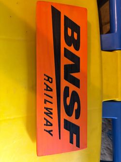 Engraved and painted railway sign