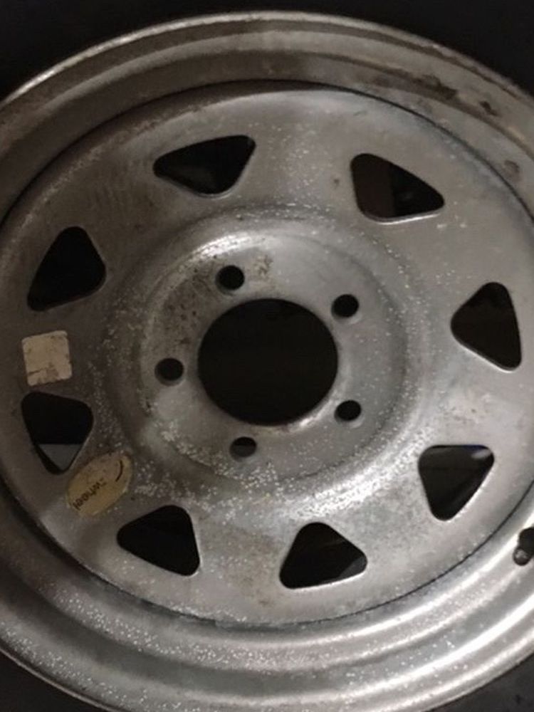 Trailer Tire Mounted On A Galvanized Rim