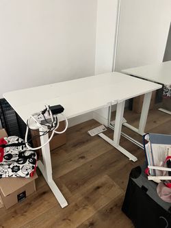 Desk with adjustable height