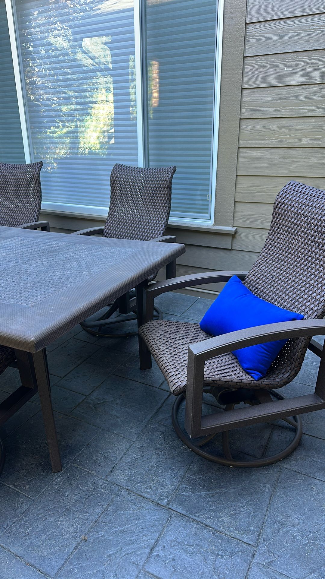 Patio Table And Six Rocker-swivel Chairs