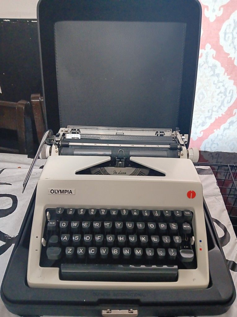Olympia Type Writer Made In Germany With Travel Case.