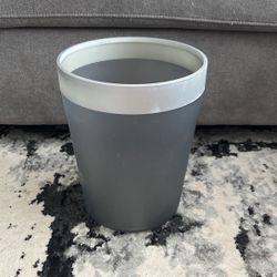 gray translucent trash bin