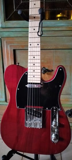 Brand new telecaster electric guitar with new gig bag cable and shoulder strap