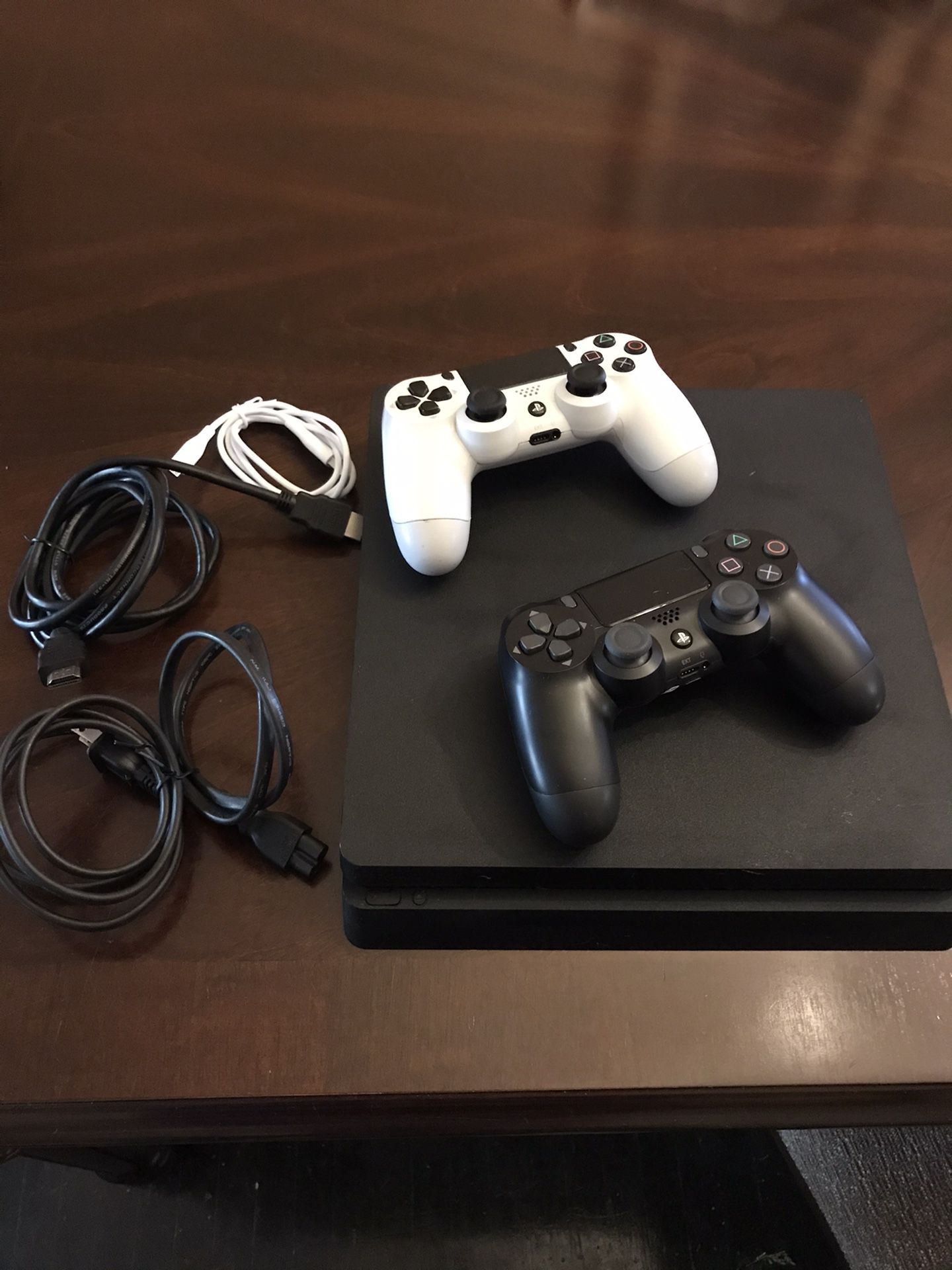 PS4 Slim w/ 2 Controllers $350