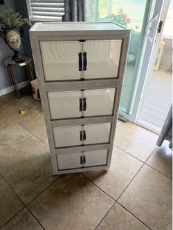 Brand new five tier plastic storage cabinet with doors and wheels space saving organizer asking $40 firm