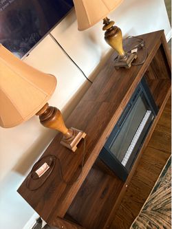 Two lamps and a fireplace $75