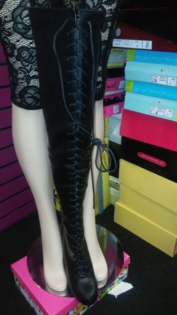 Laced up thigh high boots
