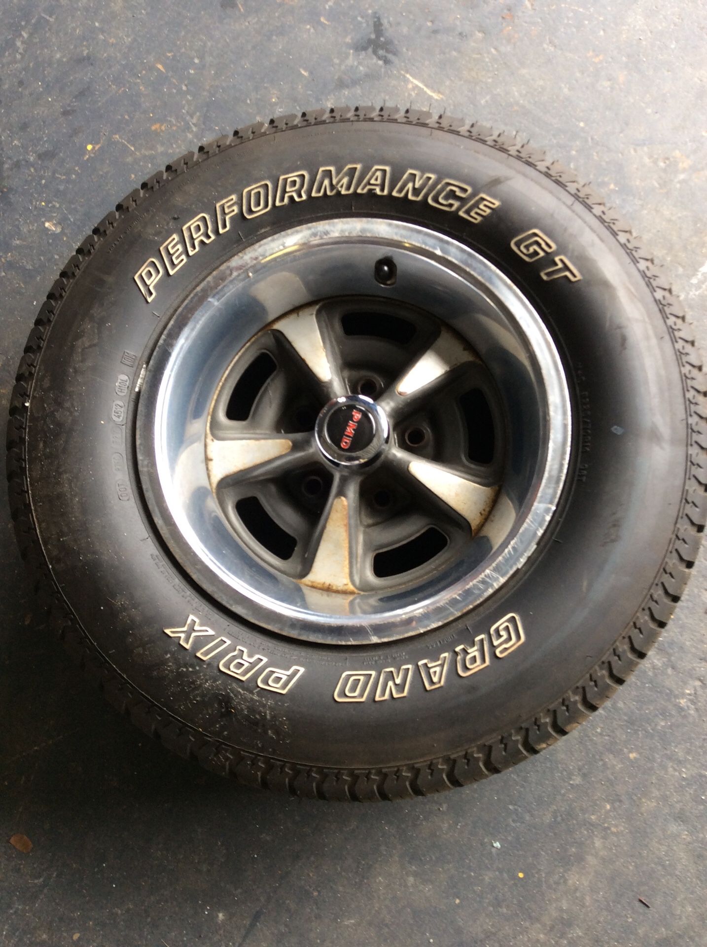 Pontiac Rally Wheel with good tire 14x7 ....off a 1972 Pontiac only 1 ...