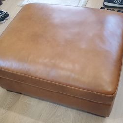 Living spaces ottoman. Camel tan/light brown.  Medium size