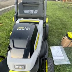 LAWN MOWER RYOBI  20” 40 VOLTS  BRUSHLESS   LITHIUM BATTERY  LEVEL POSITIONS  ((((CHARGER AND BATTERY INCLUDED)))