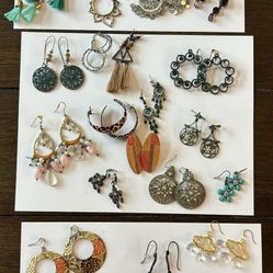 Costume Jewelry Lot with; earrings, bracelets, and rings.