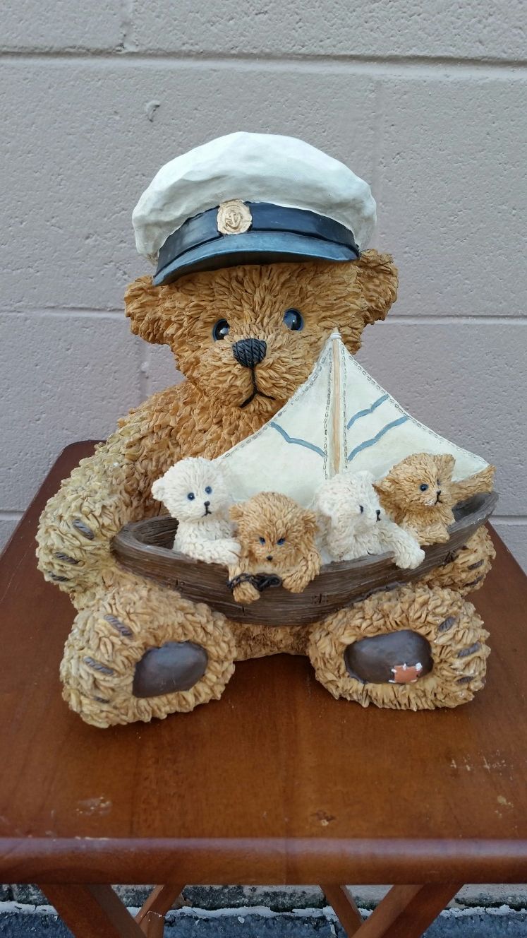 Bear with sailboat figurine