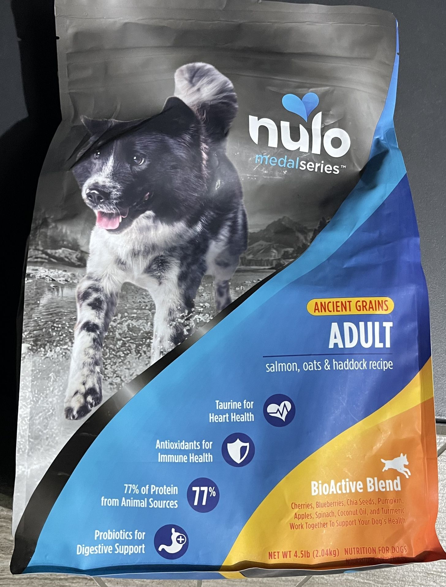 Premium And Regular Bags Of Dry Dog Food