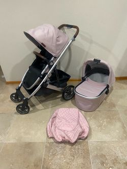 Uppababy Cruz V2 Stroller with Bassinet and Cozy Ganoosh Pink