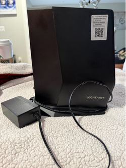 NETGEAR Nighthawk Modem Router Combo (CAX30) DOCSIS 3.1 Cable Modem and WiFi 6 Router - AX2700