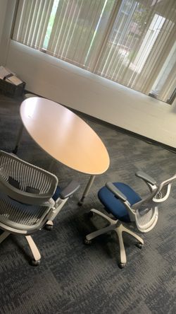 Two office chairs and table