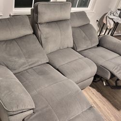 Almost new sofa with recliner