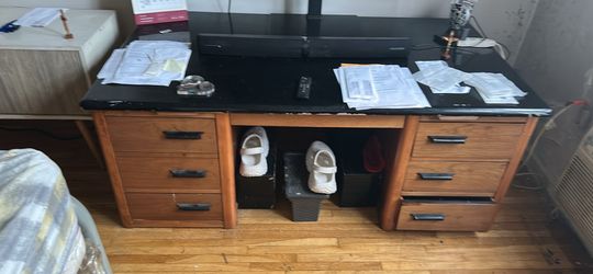 Brown and black old fashion desk.