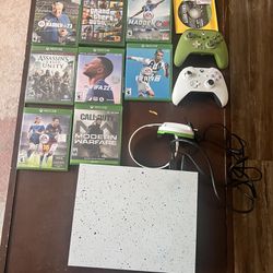 Xbox One with 7 Games And 2 Controllers 