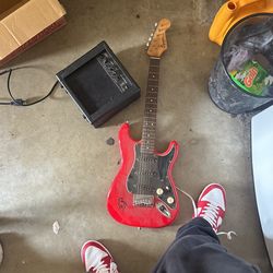 Red Electric Guitar And Amp 