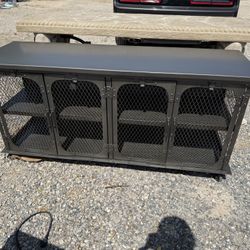Metal console table and storage cabinet with wheels
