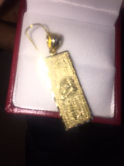 Gold dollar charm never worn