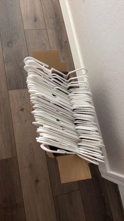 55 White clothes hanger