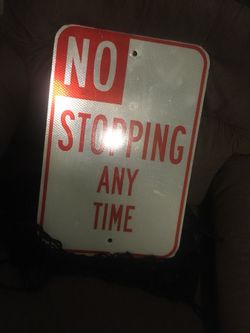 No stopping at any time street sign