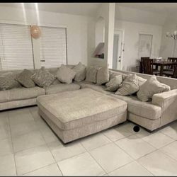 Rawcliffe 3-Piece Sectional + Rawcliffe Oversized Accent Ottoman