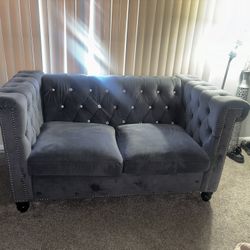 2 grey Sofas . 