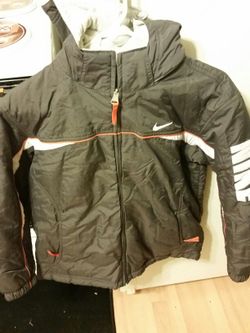 kids large or woman s\m Nike jacket