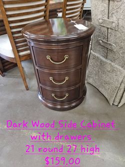 Cabinet small round w/ drawersWe are located at 2811 East Bell road. Another Time Around Furniture.