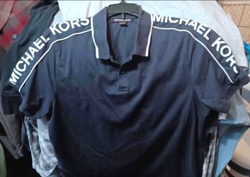 Size L Michel kors men polo style shirt.