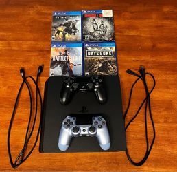 PS4 SLIM 1TB WITH 4 GAMES