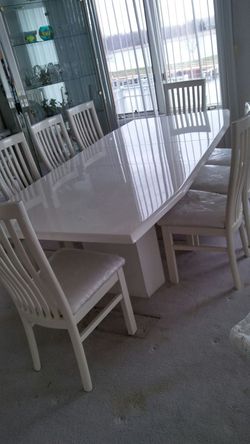 8 chairs and Formica table set