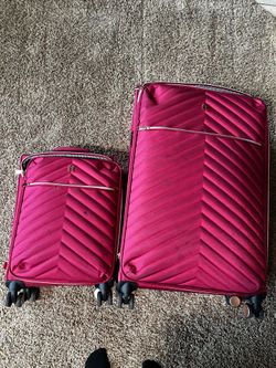 2 IT used luggages