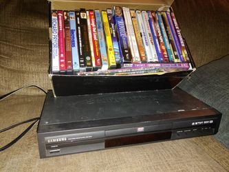Samsung DVD player and 25 plus DVDs included
