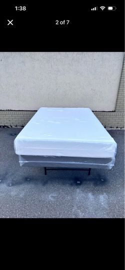 Brand new Queen size plush Memory foam mattress and box spring in plastics