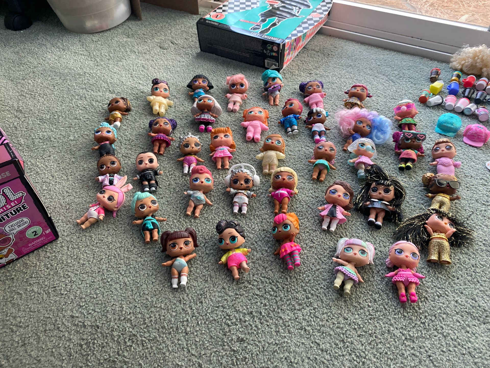 Various Lol dolls and accessories