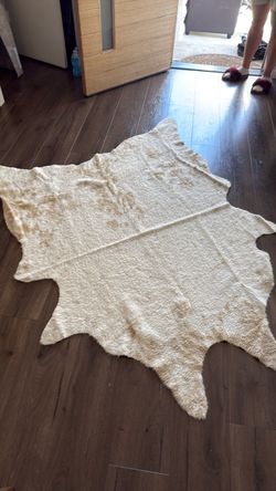 World market Faux Cowhide Area Rug Cream Beige