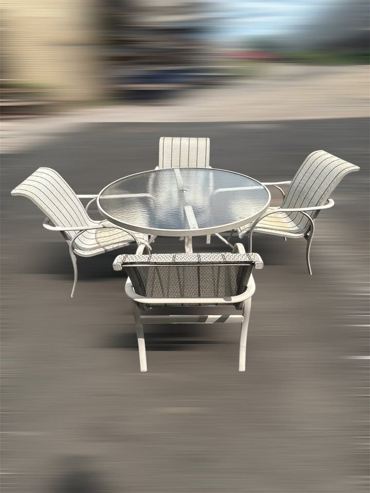 Tropitone outside furniture table set from Cabot House (Table and 4 chairs)