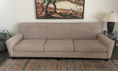 Long Comfortable Sofa (107”L x 36”W x 35”H). Great Condition.