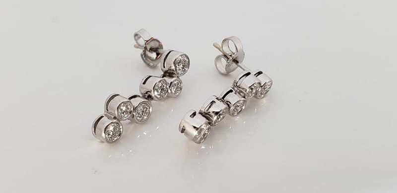 ***14k bezel set diamond earrings***