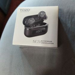 TOZO WIRELESS EARBUDS.  NEW