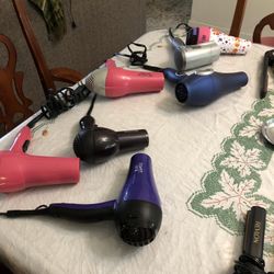 Hair Dryer,  Electric Hair Roller Or Hair Straightener 