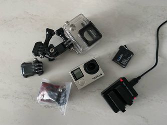 GoPro HERO4 Action Camera Bundle w/ Waterproof Case, Charger & Mounts
