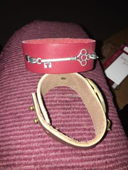New pink leather bracelet with a key